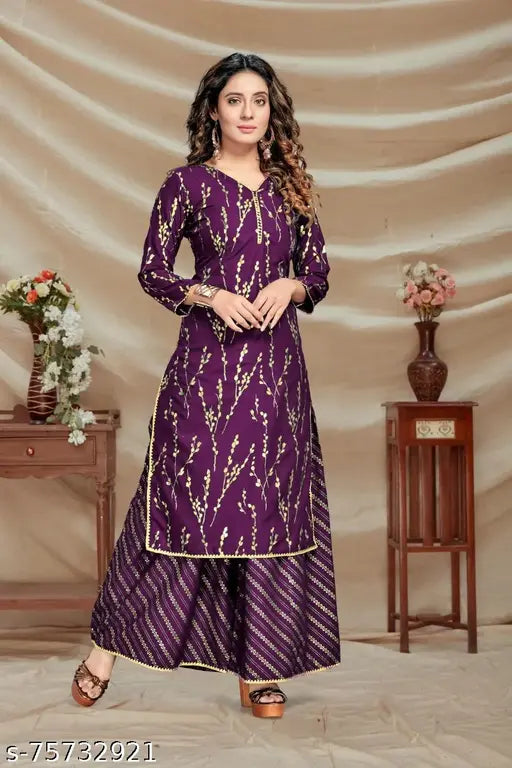 Beautiful foil-printed round neck, full sleeve straight kurta with plazo bottom in pure rayon fabric. Rayon kurta set for women's party and wedding wear, India origin
