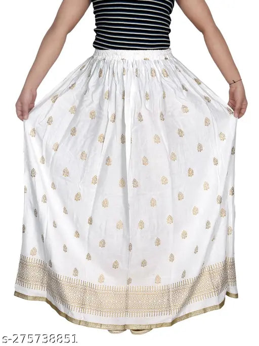 White cotton long skirt with gold embroidery