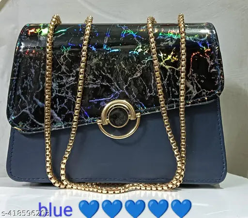 The image shows a quilted pursue with a golden chain strap. It features a floral pattern design and is placed against a blue background. The purse appears to be made of a synthetic material, possibly PU leather, and has multiple pockets on the outside, one being a large rectangular pocket with a zip closure