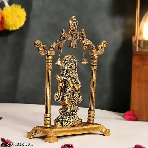 Gold-plated metal Radha Krishna idol sculpture, 15.5 cm long, 4.5 cm wide, and 18 cm high. Ideal for Diwali festival decoration or home interior decor. Handcrafted Indian artifact