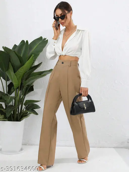 White blouse, tan trousers with pockets