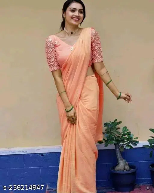 Womens peach georgette sari with mirror work