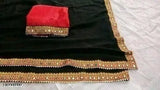 Maharani black saree with intricate designs and a vibrant red pallu