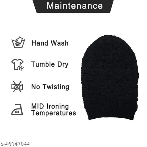 Slouchy winter beanie cap in black, knit from wool, featuring fur lining and mid-length sleeves