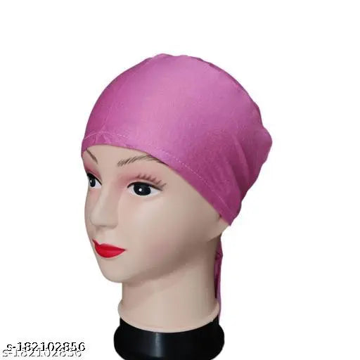 Pink hijab cap with a black headband, likely made from silk or satin