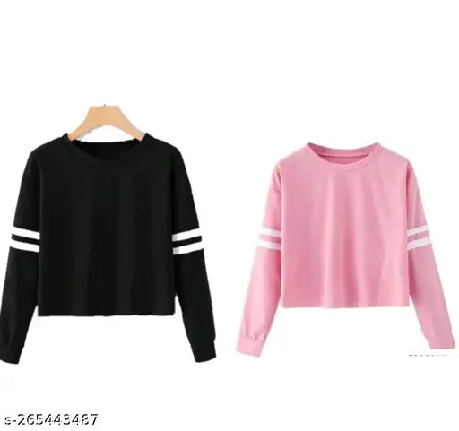 Cotton premium long sleeves women's t-shirt by AS Creation, solid color on display rack