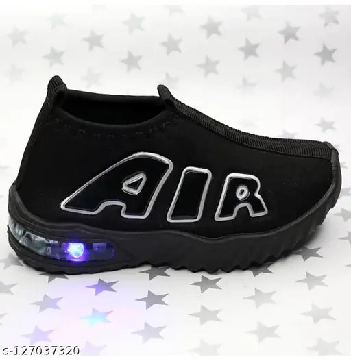 Black and white sneakers with blue LED lights on soles