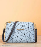 Black and blue geometric print sling bag with crossbody strap