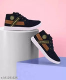Black and brown sneakers with gold zippers
