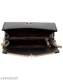 Women's black sling bag with shoulder strap and gold zipper