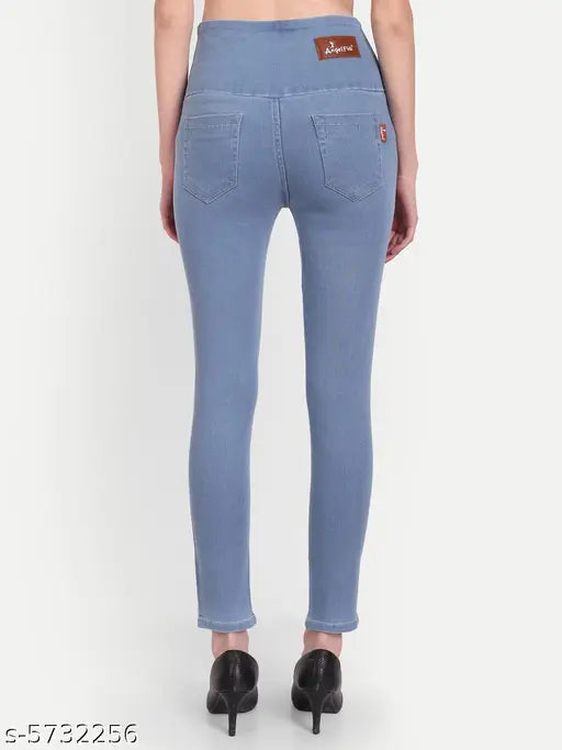 Solid skyblue denim skinny fit jeggings with high waist and elastic closer for women, ankle length on model