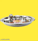 Stainless steel pooja thali set with deepa agarbatti stand, perfect for spiritual ceremonies like Grah Pravesh, Raksha Bandhan, Ganesh Chaturthi, Navaratra, Diwali. Lightweight, sturdy, and rust-resistant. Includes 1 pooja thali, 1 incense holder, 1 diya stand, and 1 small katori. Ideal for home or office decor. Made in India