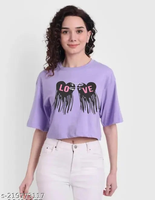 Woman wearing oversized round neck casual crop top with t-shirt design on a white background