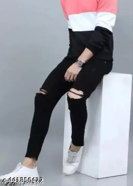 Men's black knee-cut polycotton jeans, dyed/washed, fit for any occasion. Monk Men Jeans by Shriradhe Enterprises." (106 characters)