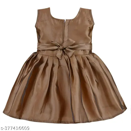 Maroon and brown satin frock for girls with gold embroidery, featuring tassel detail and zipper closure - Indian origin