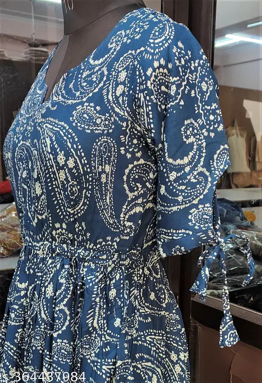Blue viscose rayon pleated kurti with ethnic motifs embroidery, short sleeves, and various sizes available (S-XXXXL)
