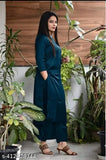 Teal viscose rayon kurta pant set for women and girls, suitable for parties, weddings, office wear. Solid-patterned, three-quarter sleeves, palazzos style. High-quality, comfortable, and fashionable Indian clothing