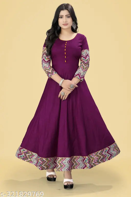 Wine rayon anarkali kurti with three-quarter sleeves, solid border design. Perfect for office wear, social gatherings, or important occasions. Breathable and comfortable cotton material. Available in various sizes from XXS to 10XL. Indian-made fashion dress