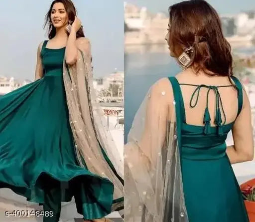 Merald green Anarkali art silk gown with net dupatta, sleeveless and suitable for Indian women's parties or weddings