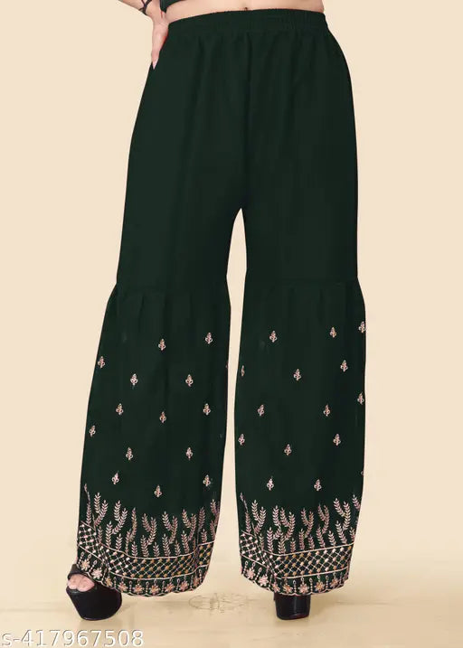 Teal embroidered women's kurta set with full inner, matching pants