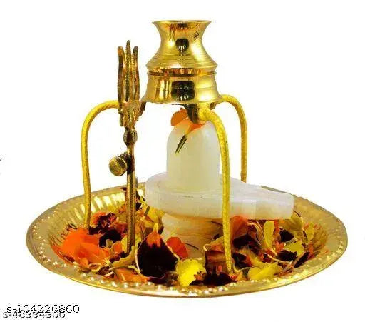 White Marble Shiva Lingam set with brass stand, abhishek lota, kalash tripai plate, and trishul. Traditional Indian puja thali for Shivling worship, dimensions: 16x16x18 cm