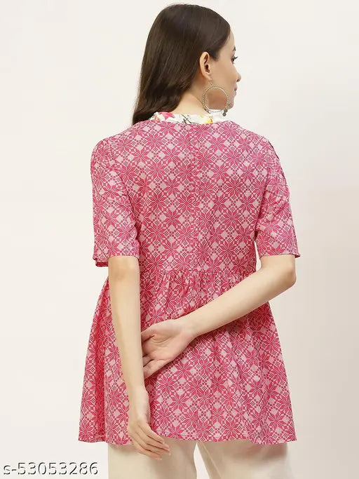 Pink and white printed cotton A-line top by JAPER KURTI, short sleeves with floral print and tie ups on sleeves, V-neck design