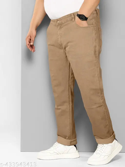 Brown denim Rigbone men's relaxed jeans, stylish and stretchable for casual, party, or office wear. Plus size with regular fit, mid-rise, and zip fly closure. Available in sizes: 40 (41W/42L/46H), 42 (43W/42L/48H), 44 (45W/42L/50H), 46 (47W/42L/52H), and 48 (49W/42L/54H). Origin: India