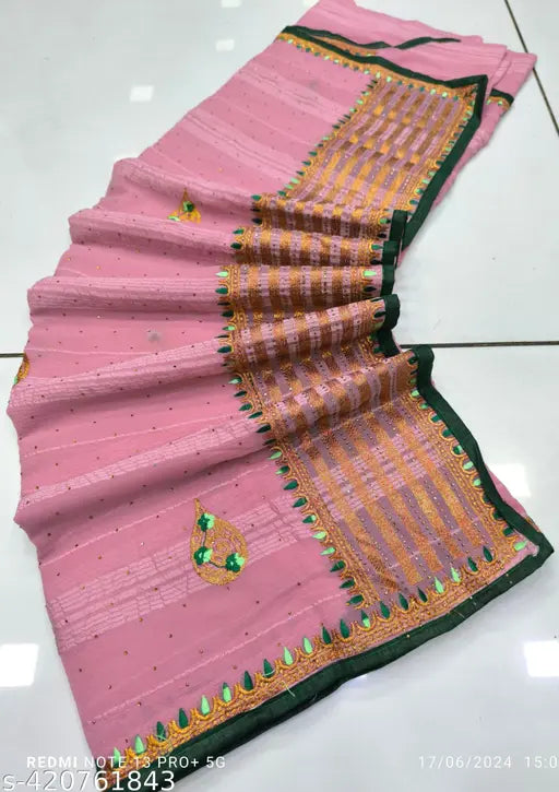 Pink and gold hand fan with intricate designs