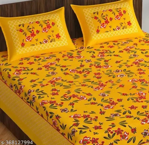Yellow Rajasthani bedsheet set with floral print, 100% cotton, 2 pillow covers.