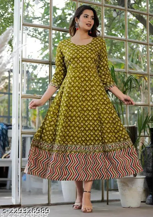 Green rayon Anarkali long embroidery kurti gown for women and girls, perfect for parties and festivals