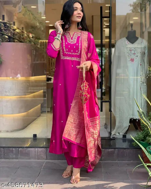 Silk-blend Adesh Kurta set with dupatta and bottomwear, embroidered viscose chanderi top and plain viscose chanderi bottom, jacquard dupatta. Solid pattern, three-quarter sleeves. Available in S, M, L, XL, XXL sizes. Made in India