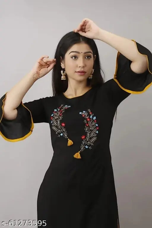 Black embroidered kameez with yellow and orange trim