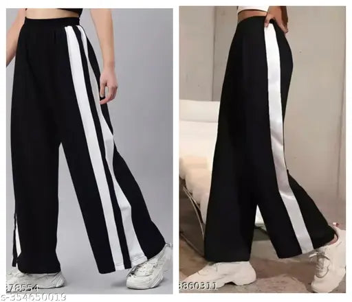 Black and white striped women's bell bottom trousers
