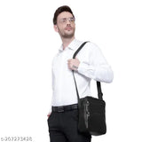 Black leather messenger bag, strap and buckle closure