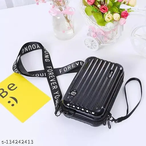 Black fabric box sling with zip closure and multiple card slots