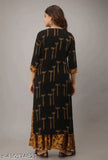 Black and gold patterned long-sleeved kurta with matching bottom