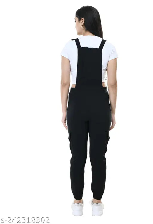 Black cotton blend sleeveless dungaree for women, solid design on full length figure (Note: The word count is 79 characters.)