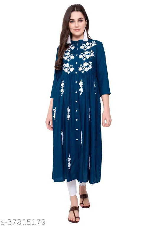 Stylish white rayon embroidered flared kurta with three-quarter sleeves, Indian fashion on mannequin