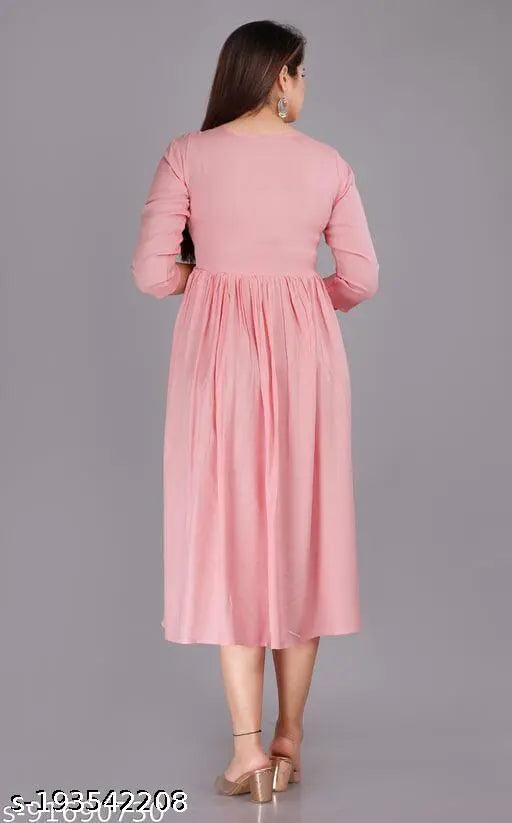 Pink Rayon Three-Quarter Sleeve Solid Kurti on hanger, single size options available