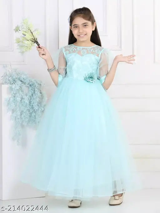 A blue and white dress with embellishments, suitable for a girl's party