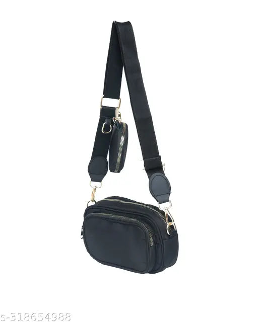 Black sling bag with small pouch, strap closure