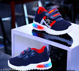 Blue and Red synthetic LED light shoes for kids up to 7 years, fastening detail with Velcro