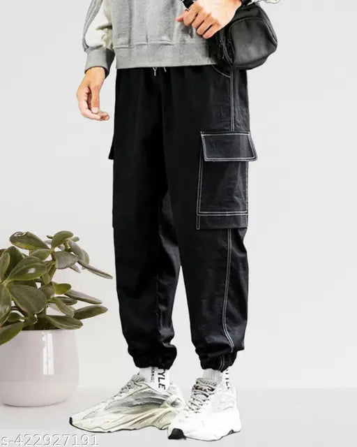 Gray and black camouflage patterned baggy pants for men with zipper detailing and pockets