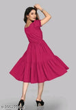 Pink rayon short-sleeved party dress for women, stylish and festive attire on mannequin