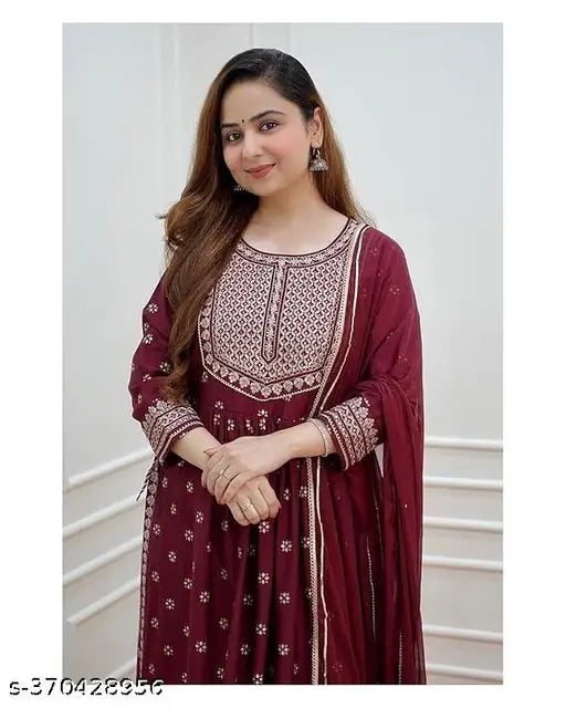 Maroon Chanderi Silk Dibbi with Zari woven pattern, three-quarter sleeve length, available in M-XXXL. Indian ethnic wear on mannequin