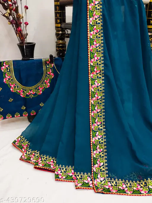 Teal georgette saree with intricate floral embroidery and matching blouse