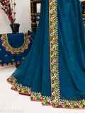 Teal georgette saree with intricate floral embroidery and matching blouse