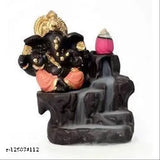 Polyresin pink Ganesh fountain showpiece with incense-activated smoke effect, 10x10x8cm, handcrafted in India