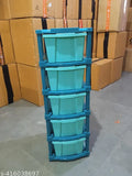 Blue and green plastic storage containers with multiple compartments, stackable design