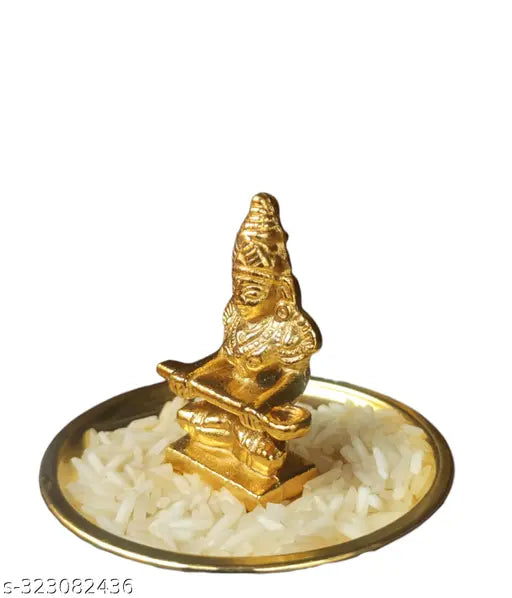 Golden finish copper idol of Mata Annapurna devi for home temples, Indian artisan crafted metal deity on altar